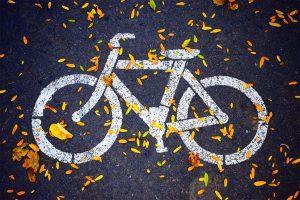 Photo of a bike symbol on a paved bike path